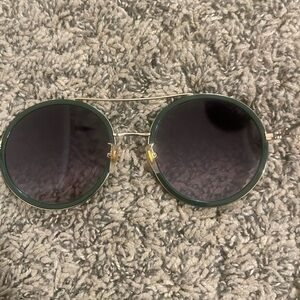 Gucci sunglasses in good  condition with some scratches on the lens FINAL PRICE